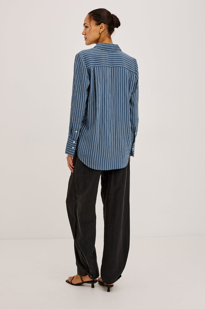 Beck Shirt in Luxe Rayon With Collar, Button Front, Chest Patch Pocket, Long Sleeves, and Relaxed Fit in Washed Indigo Stripe Colorway - Full Body Back View Featured on Model