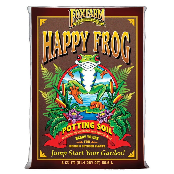A bag of FoxFarm Happy Frog Potting Soil, featuring a cartoon frog against a backdrop of ferns and water lilies.