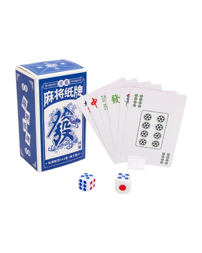 Mahjong playing card box with fanned cards and two dice