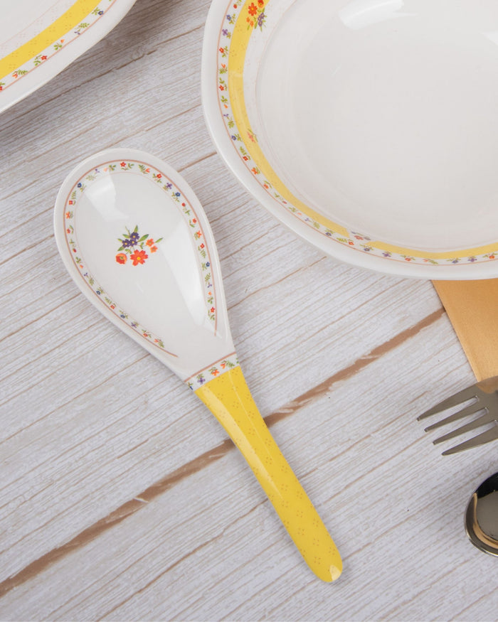 Melamine ladle serving spoon with white bowl and yellow floral print, yellow handle