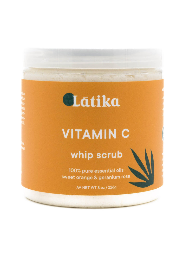 Whip Scrub | Latika jar with bright orange label featuring Vitamin C formula, infused with sweet orange and geranium rose essential oils for skincare and body care.