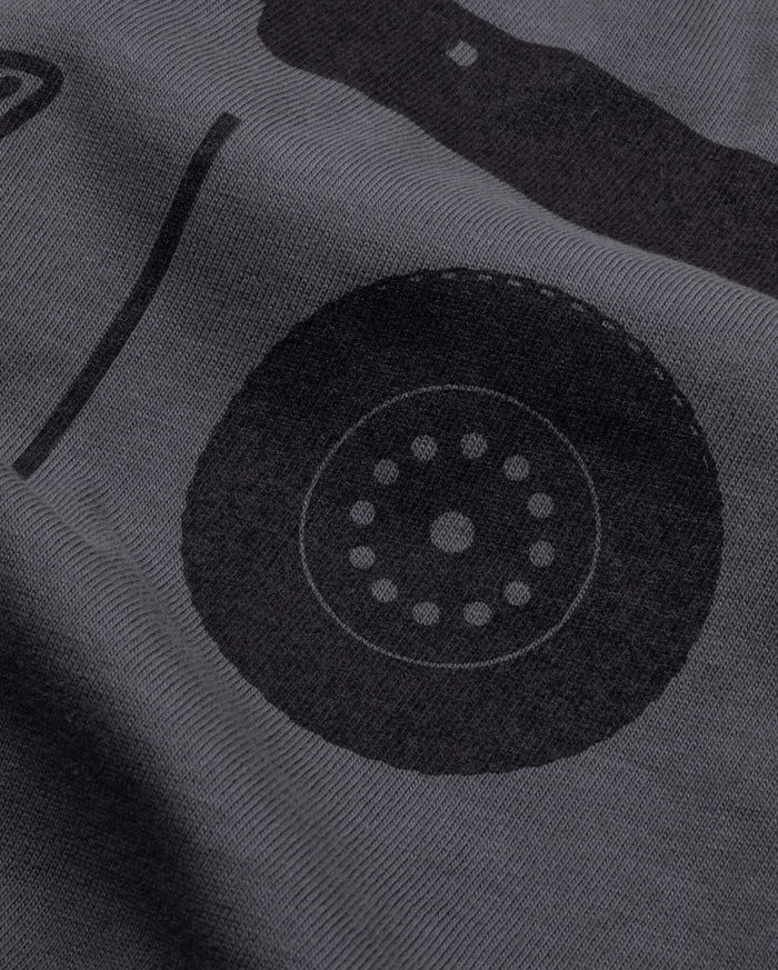 Asphalt Womens Road Issued SS Tee - Close-up of wheel graphic detail | Benchmade Knife Co.