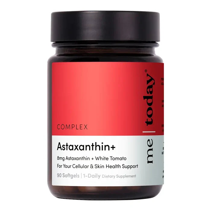A dark amber supplement bottle with a black lid and a red-and-white label.