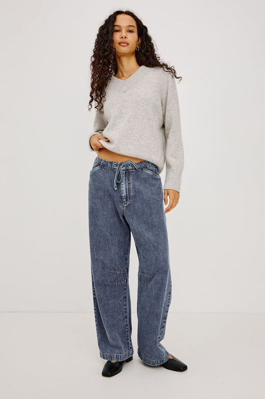 Barry Pant in Cotton Lyocell Denim With Wide Legs That Taper at Hem, Front Zip, Grommet Drawstring Waistband, and Side Slant Pockets in Blue Lagoon Colorway - Full Body Front View Featured on Model