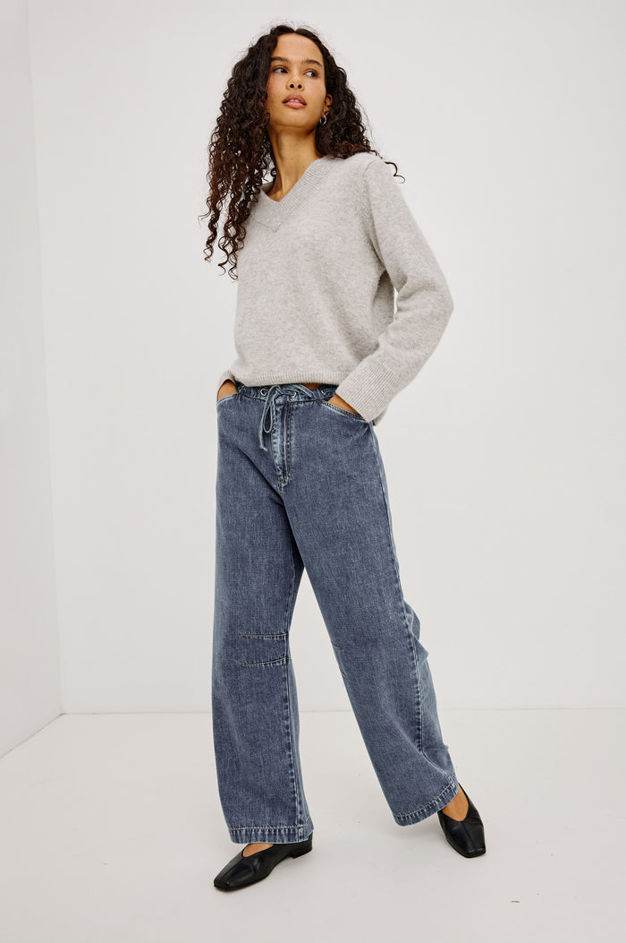 Barry Pant in Cotton Lyocell Denim With Wide Legs That Taper at Hem, Front Zip, Grommet Drawstring Waistband, and Side Slant Pockets in Blue Lagoon Colorway - Full Body Front View Featured on Model