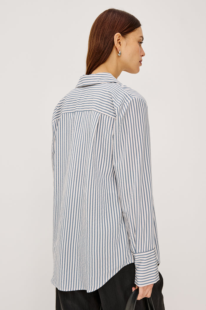 Beck Shirt in Luxe Rayon With Collar, Button Front, Chest Patch Pocket, Long Sleeves, and Relaxed Fit in Ivory Steel Blue Stripe Colorway - Upper Body Back View Featured on Model