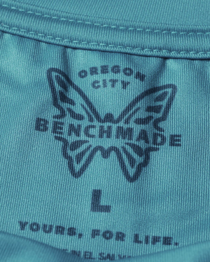 Depth Blue Butterfly Tech Tee - Zoomed Butterfly Wing Logo Graphic on Teal Tech Fabric | Benchmade Knife Co.