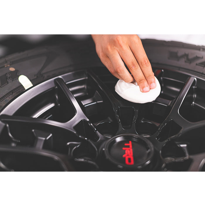 Using C5 Wheel Armor from Gtechnoq to coat the surface of a black Toyota TRD wheel