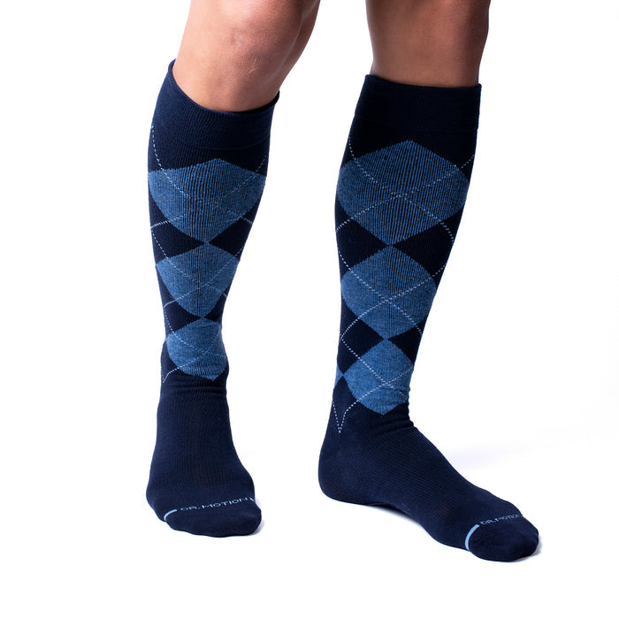 Knee-high compression socks featuring a classic argyle pattern in navy and blue tones.