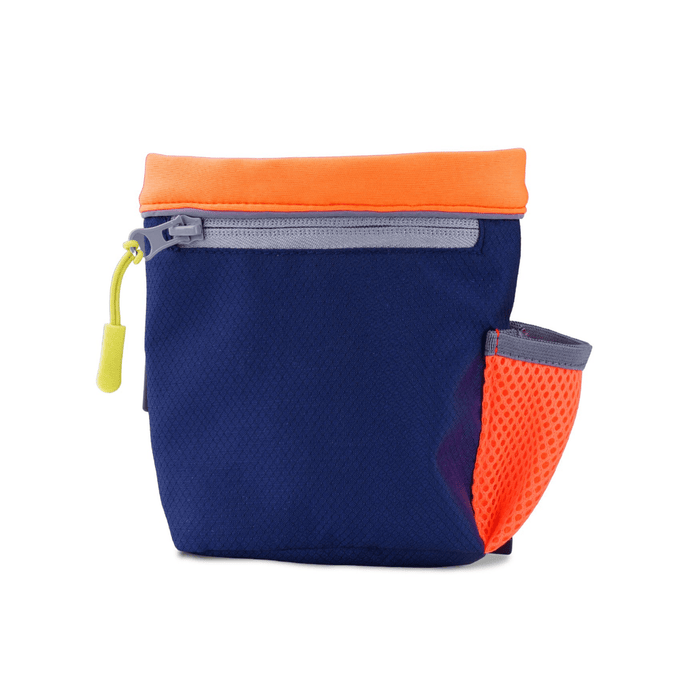 White background with a a Coachi Train and Treat pouch in navy and coral.