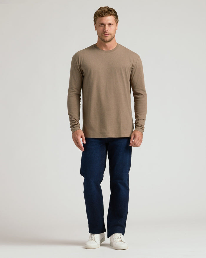 Man wearing Dark Heather Sagewood Classic Long Sleeve Crew Neck.