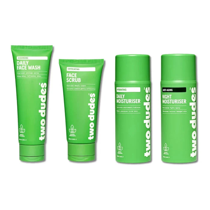 Two Dudes Deluxe Kit containing Daily Face Wash, Face Scrub, Daily Moisturiser, Night Moisturiser all in lime green packaging.