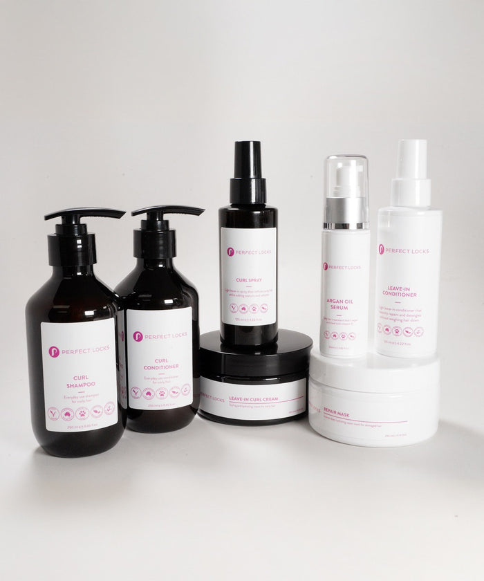 The Perfect Locks Dry Curly Hair Reviver Bundle includes shampoo, conditioner, spray, creams, serum, mask, and leave-in.