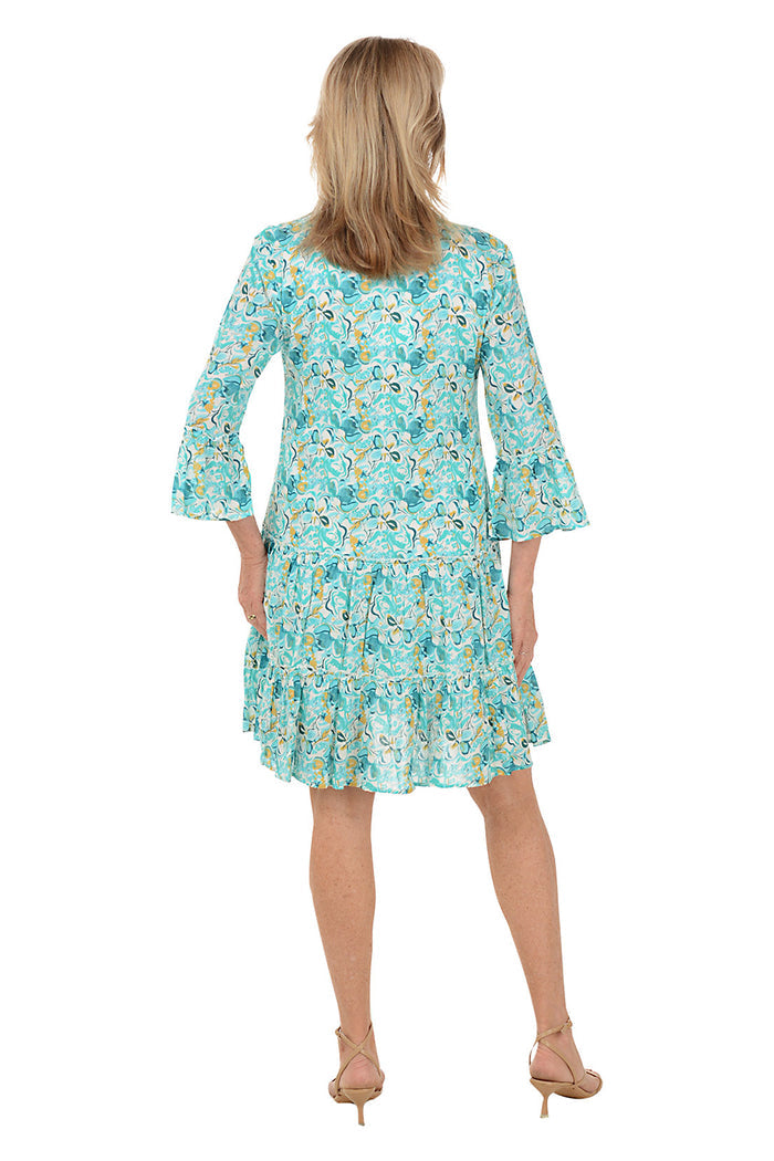 Woman wearing a floral dress on a white background