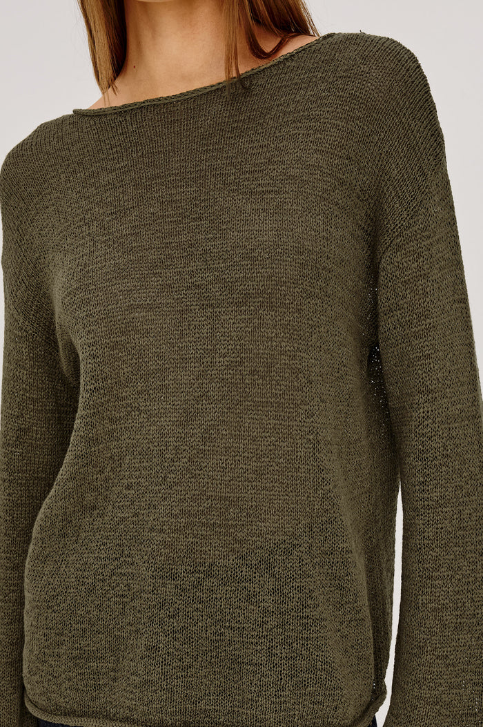 Evangeline Sweater in Luxe Linen Blend With Open Weave, Boat Neck, Relaxed Dropped Shoulders, and Long Sleeves in Olive Colorway - Upper Body Front View Featured on Model
