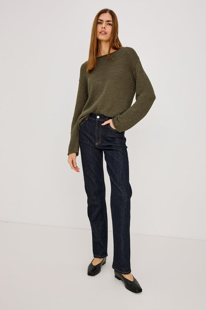 Evangeline Sweater in Luxe Linen Blend With Open Weave, Boat Neck, Relaxed Dropped Shoulders, and Long Sleeves in Olive Colorway - Full Body Back View Featured on Model