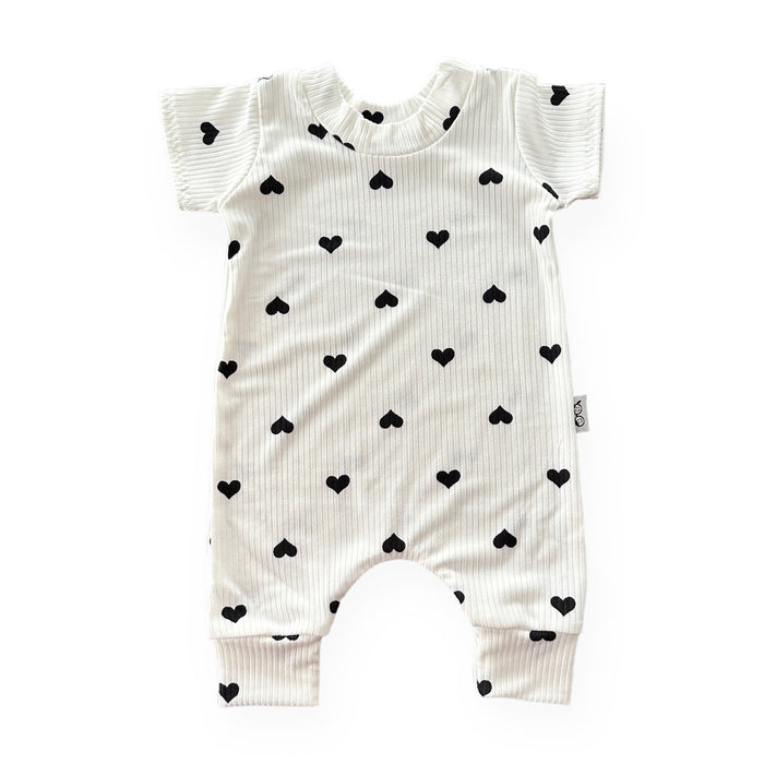 Flipped Black Hearts on White Ribbed Harem Romper