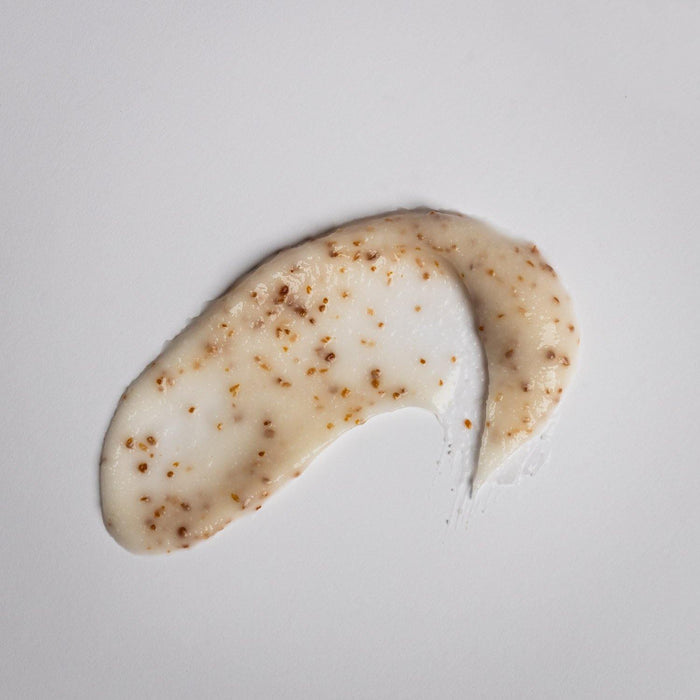 Smear of Gentle Refining Scrub | Alchimie Forever showing creamy texture with exfoliating natural granules, ideal for gentle skincare and revitalizing the skin surface.