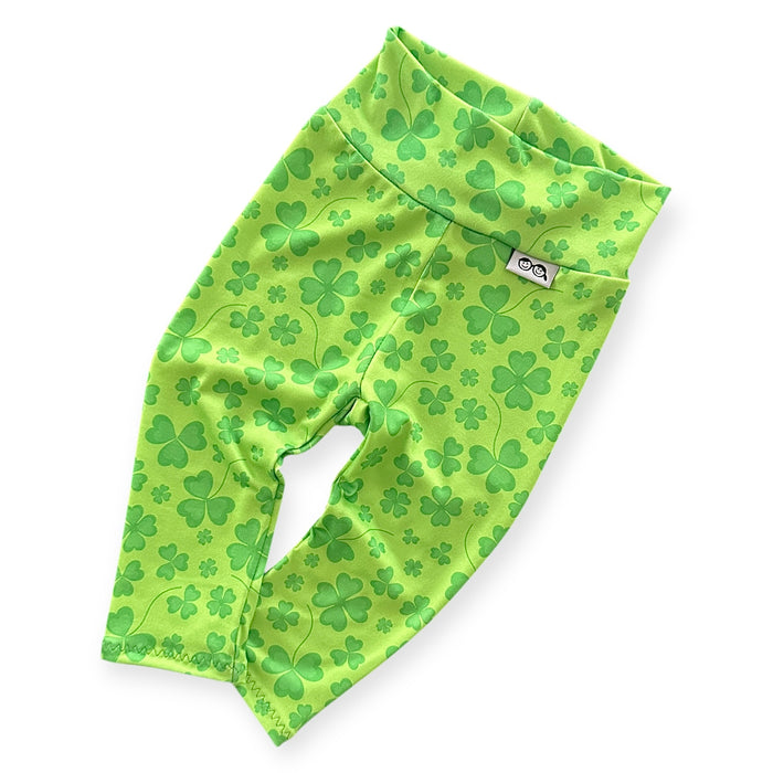 Bright green shamrock leggings for babies and toddlers, perfect for St. Patrick's Day or festive everyday wear. Soft, stretchy, and comfortable for active little ones.