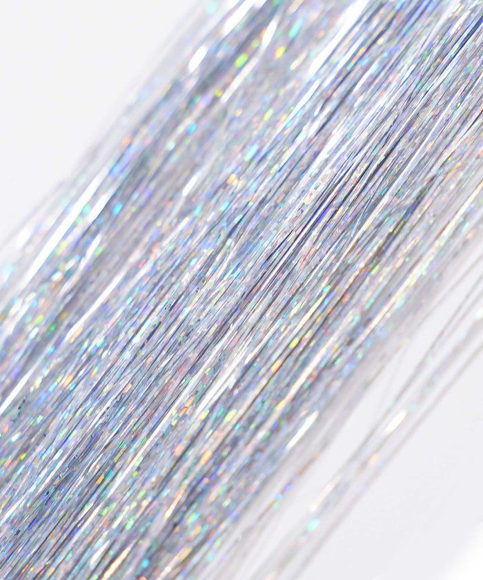 Perfect Locks’ Perfect Hair Tinsel in Shiny Black has thin, reflective strands that add a stunning shimmer and subtle shine to hair.#color_silver