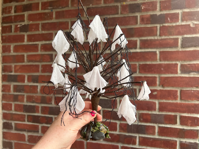 Halloween Tree with White Ghosts Hanging on Branches