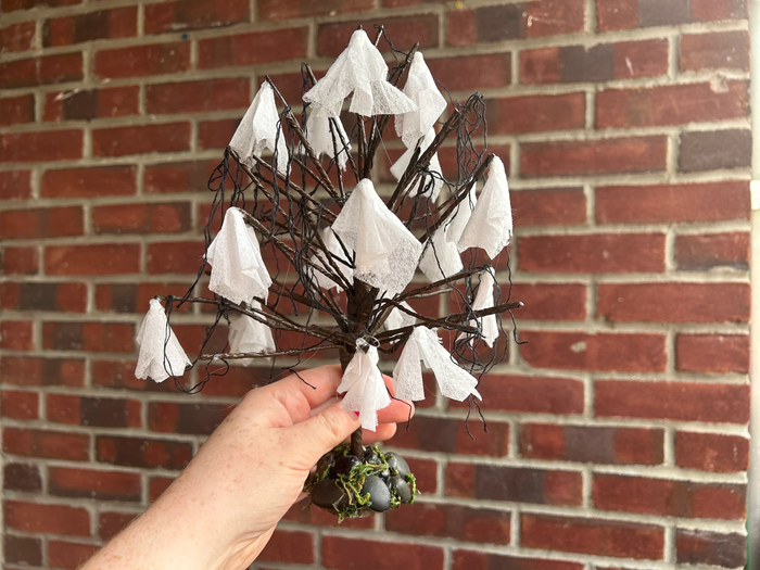 Halloween Tree with White Ghosts Hanging on Branches