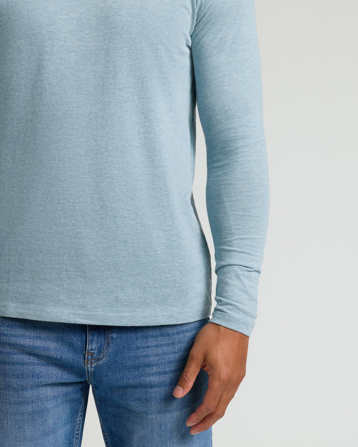 Heather Sapphire Classic Long Sleeve Crew Neck shown tucked into blue jeans.