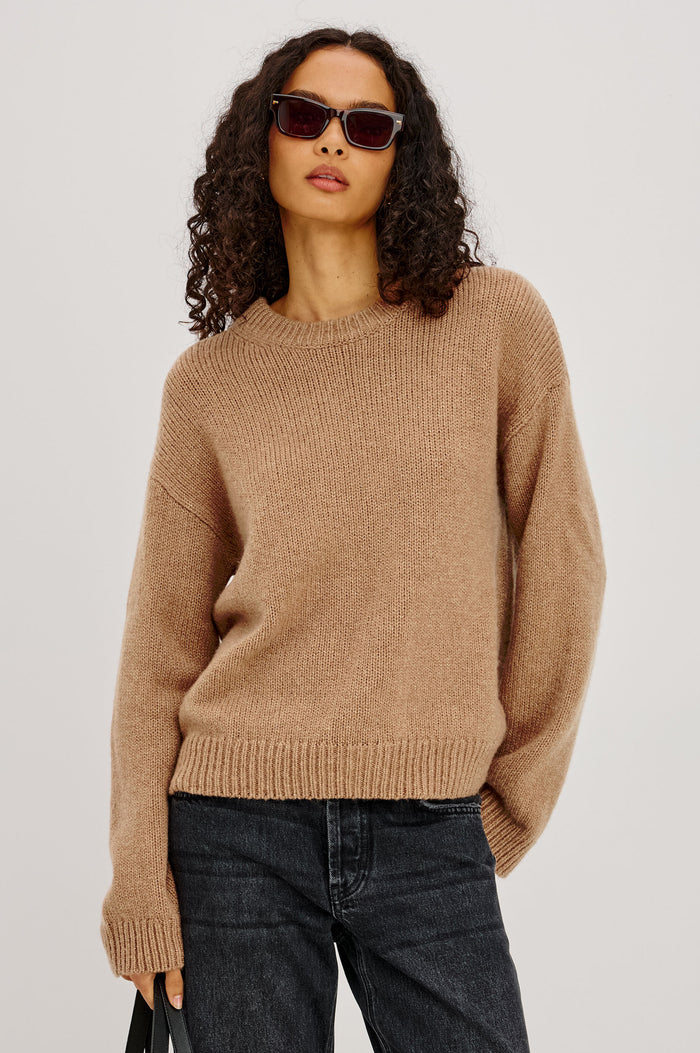 Helly Sweater in Wool-Cashmere Blend With Crew Neckline, Relaxed Boxy Slightly Cropped Fit, Long Sleeves, and Ribbed Trim in Heather Camel Colorway - Upper Body Front View Featured on Model