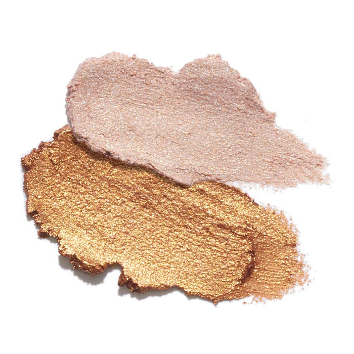 Two swatches of makeup in pink and gold on a white background.