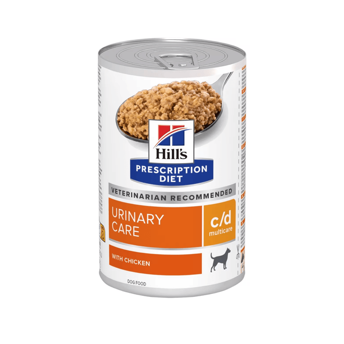 Hills Prescription dog food tin with a spoon full of food pictured on the label, text reads 'Urinary Care, C/D Multicare' and 'with chicken' on a white background.