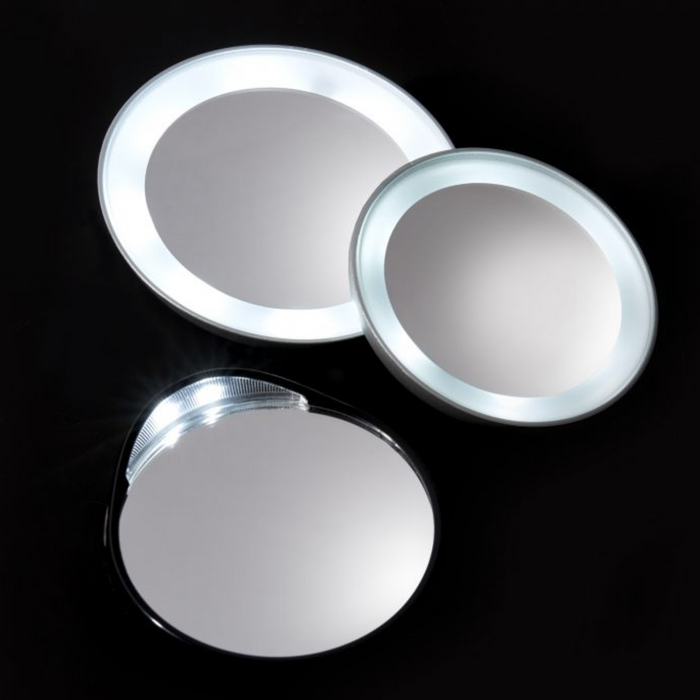 Three round illuminated mirrors with bright LED lighting, showcasing the LED 15X Lighted Mirror | Tweezerman perfect for detailed skincare and beauty routines.