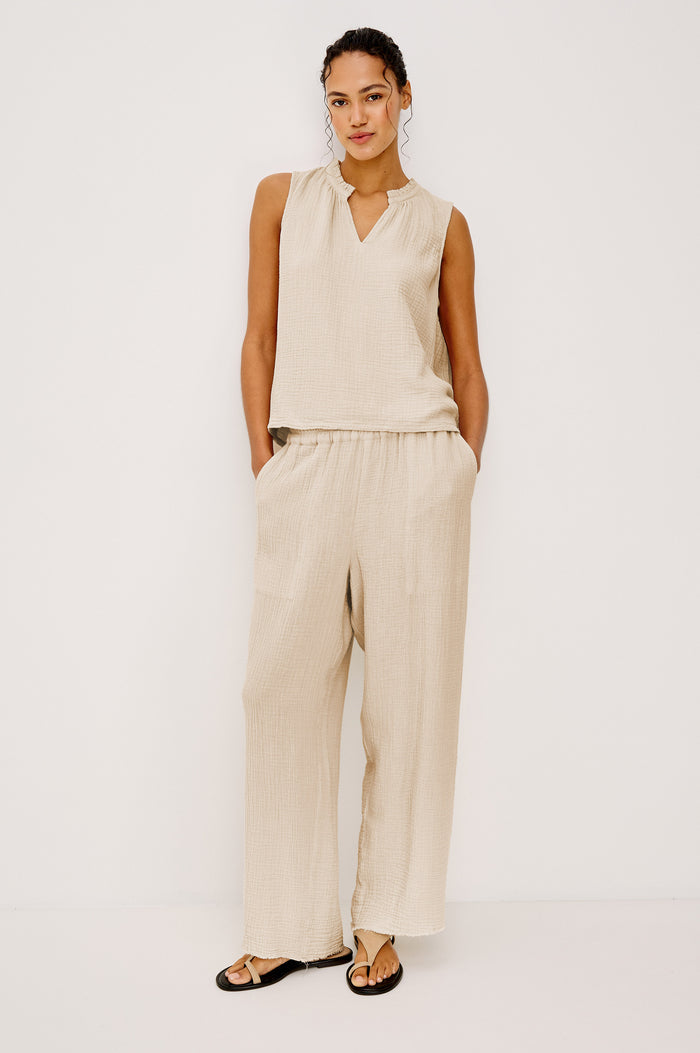 Leon Crop Pant with a Smocked Waistband and Two Front Seam Pockets in Light Brown Heather Flax Colorway - Full Body Front View Featured on Model