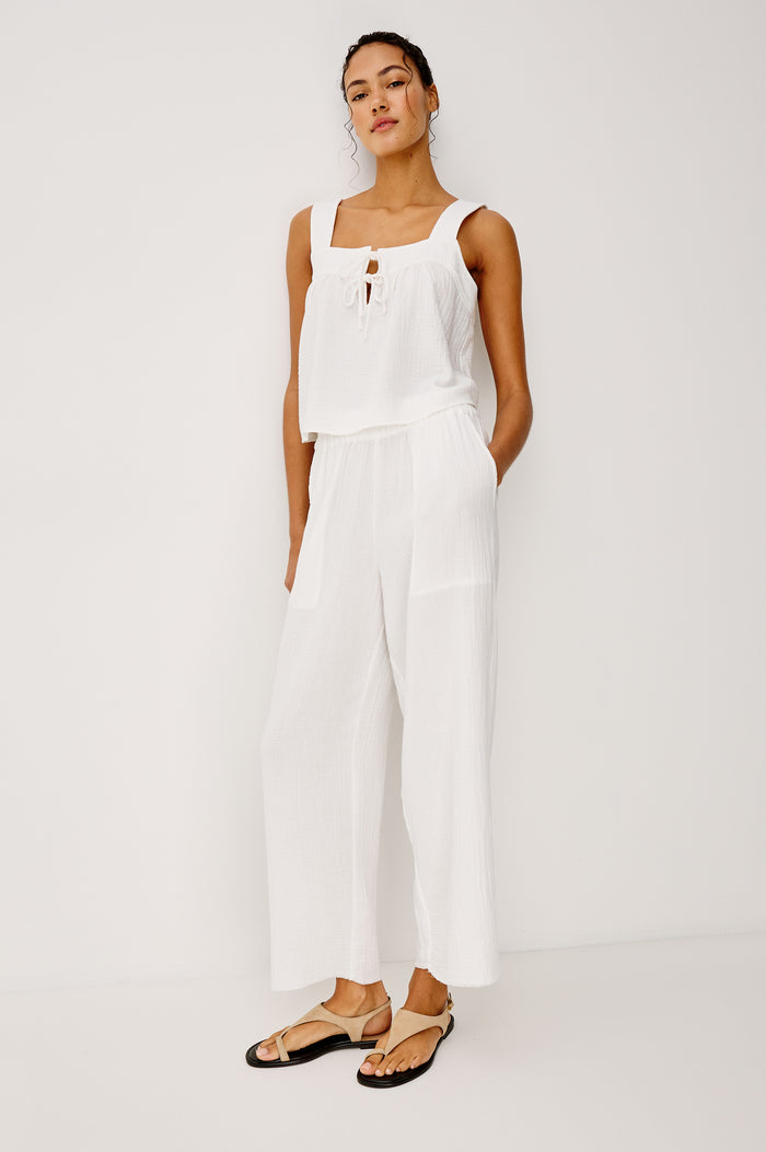 The Leon is a cropped pull-on style crafted from super soft airy double gauze cotton. With a wide-straight leg fit complete with side slits at the outer openings and a smocked waistband this pant puts comfort first.