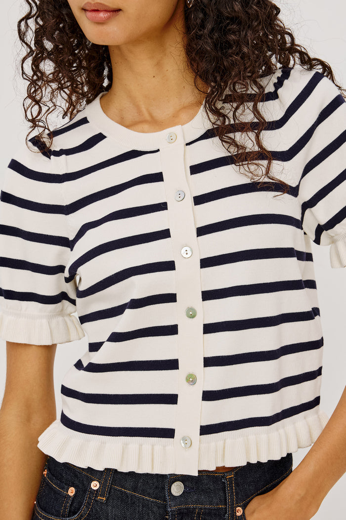 Lora Top in Wool Blend With Front Buttons, and Ruffle-Trimmed Short Puff Sleeves and Hem in Ivory Navy Stripe Colorway - Upper Body Front View Featured on Model