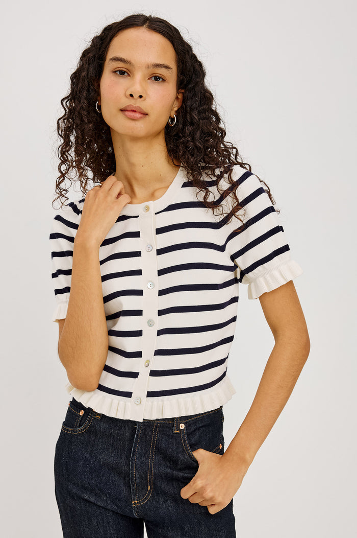Lora Top in Wool Blend With Front Buttons, and Ruffle-Trimmed Short Puff Sleeves and Hem in Ivory Navy Stripe Colorway - Upper Body Front View Featured on Model