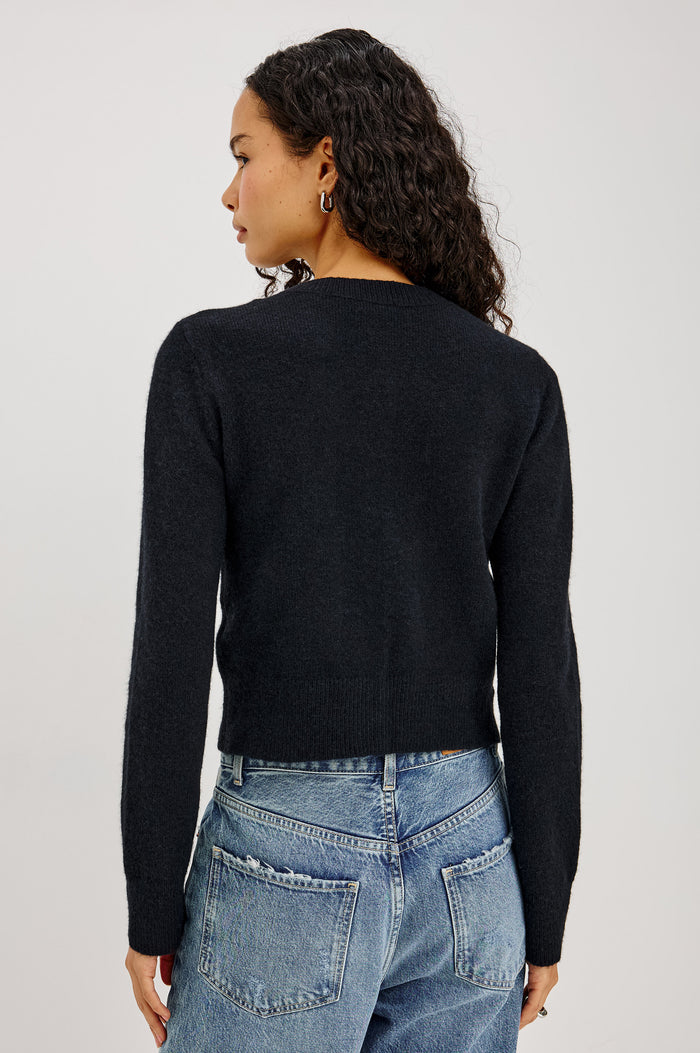 Matilda Cardigan in Wool-Blend Knit WIth Relaxed Slightly Cropped Fit, Crew Neck, Front Buttons, and Ribbed Trim in Black Colorway - Upper Body Back View Featured on Model