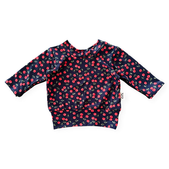 Long sleeve cherry print pullover for babies and toddlers – trendy and cozy stretch knit top. Perfect for fall and winter layering, handmade with love.