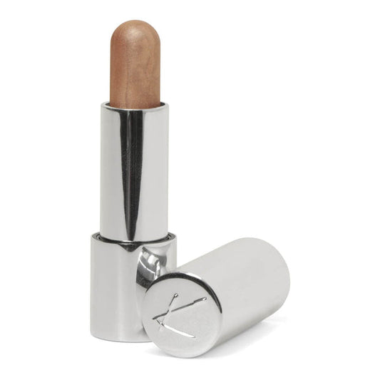 Silver tube of cream bronzer in a medium shade.