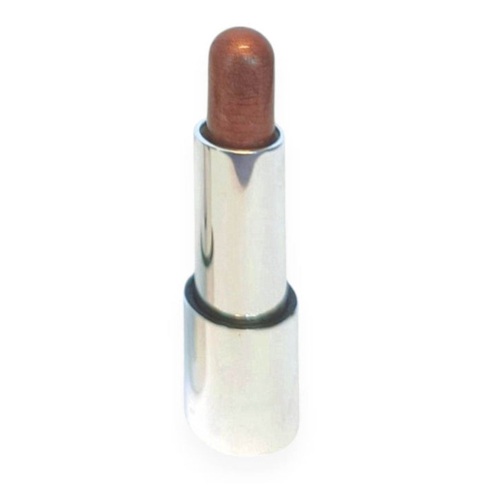 Silver tube of cream bronzer in a dark shade.