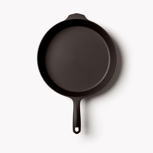 Overhead view of the No.10 Field Cast Iron Skillet on a white background, helper handle at top