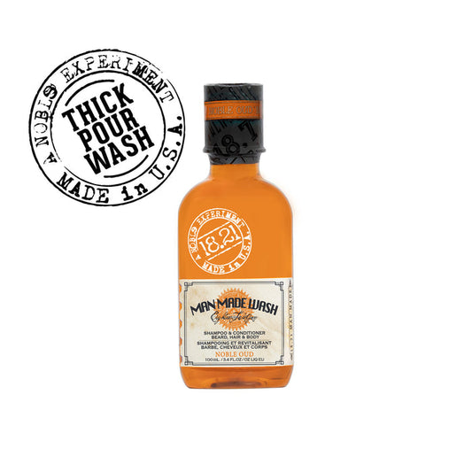 Bottle of 'Man Made Wash' with a black and white label on a white background