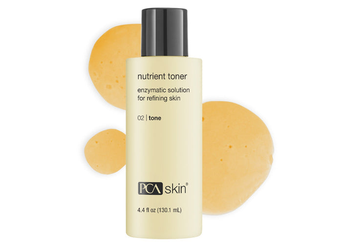 Bottle of Nutrient Toner | PCA Skin enzymatic solution for refining skin with light amber liquid drops on a white background, skincare product for tone improvement.