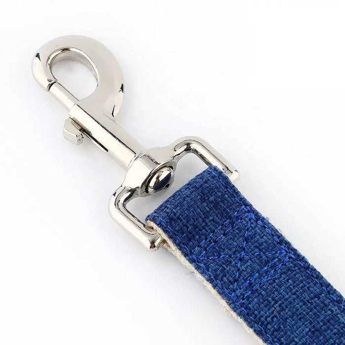 Blue strap with silver metal clip on a white background.