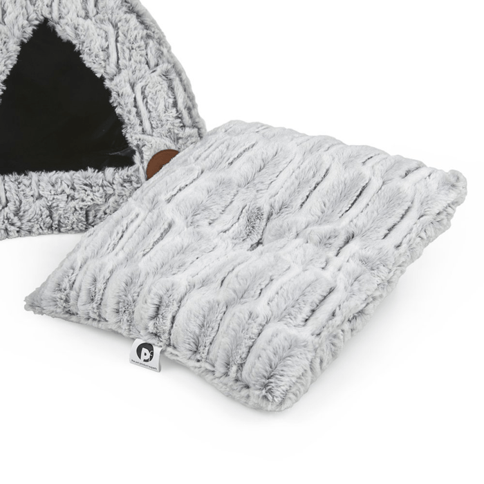 Grey plush igloo pet bed with internal grey cushion removed from inside, cushion is at the forefront of the picture.