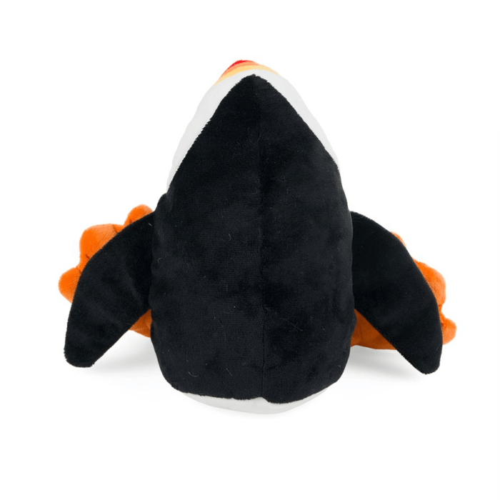 Back view of a Plush Puffin dog toy with a red, orange and yellow beak and orange feet, sat on a white back ground.