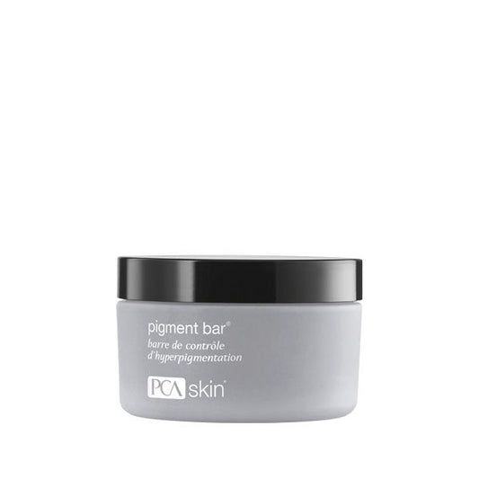Container of Pigment Bar | PCA Skin with a sleek gray jar and black lid, designed for skincare focused on reducing hyperpigmentation and improving skin tone.