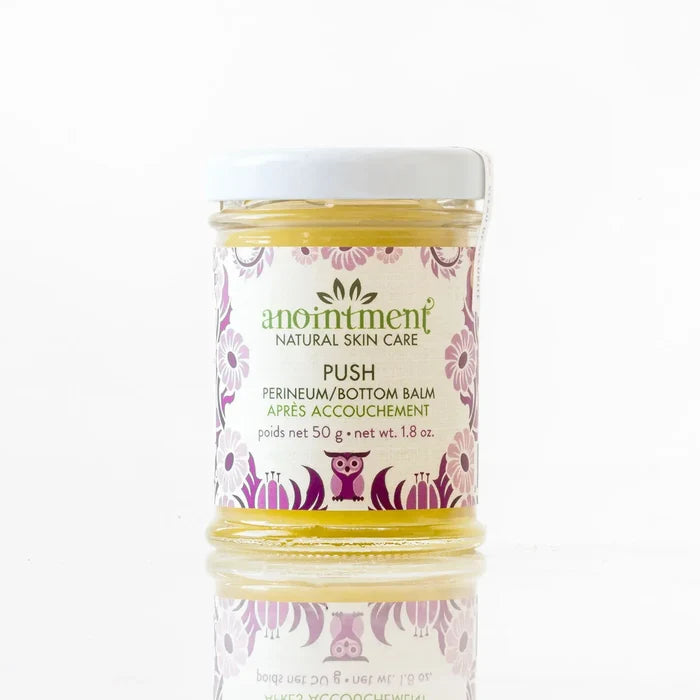 Anointment postpartum perineum balm in glass jar, formulated to support healing and comfort for new moms