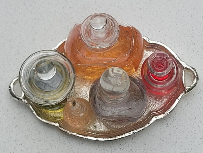 Potions and Frog in Glass Jar on Metal Platter