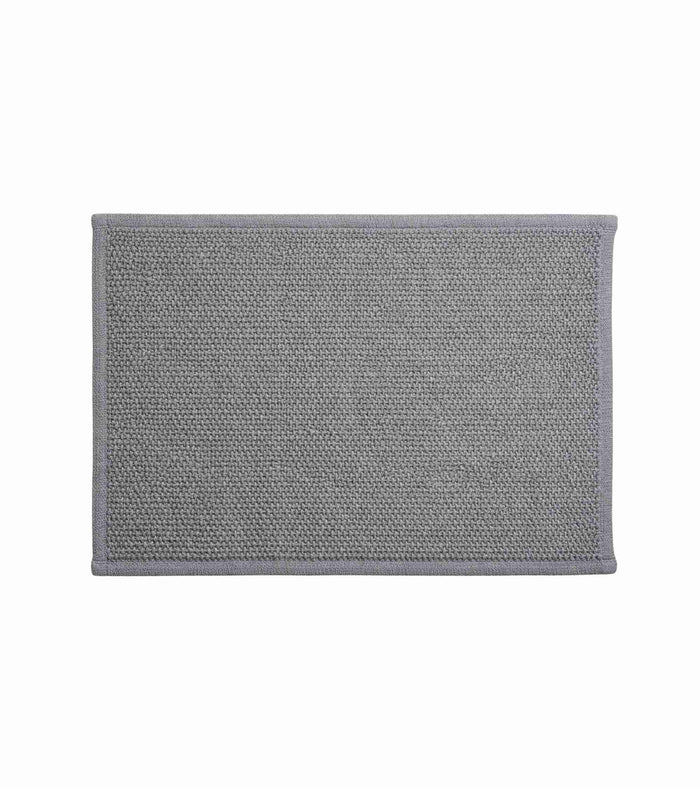 Grey anti-skid bath mat, woven texture with stitched border; 60 x 40 cm