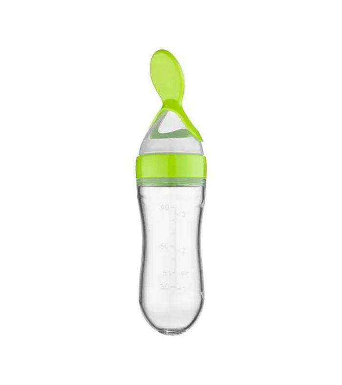 Green silicone weaning bottle with LSR spoon and translucent 120ml reservoir